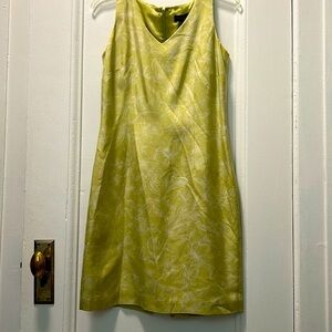 A timeless, classic dress, 100% silk lining in a vibrant chartreuse hue.